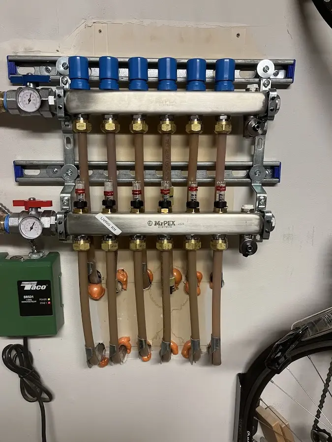 Plumber performing Water Heater Repair at a residential property in Damascus